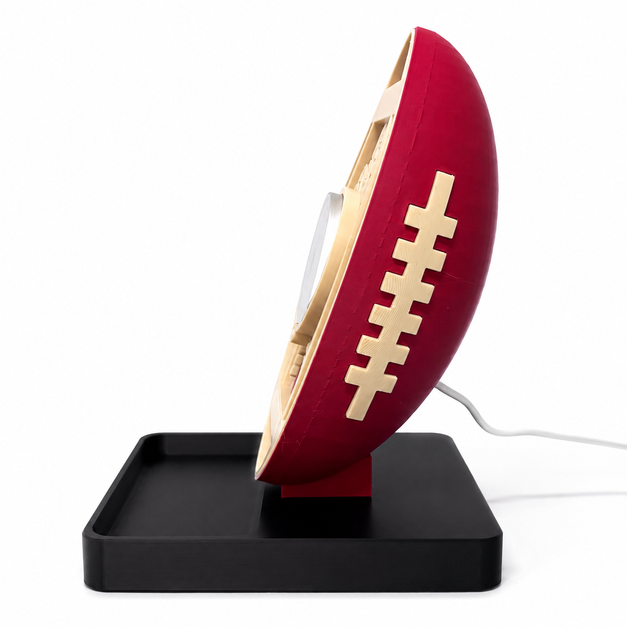 Football Wireless Charger Stand showing player silhouette cutout design and 25W Qi2 MagSafe charging pad, 3D printed plant-based PLA
