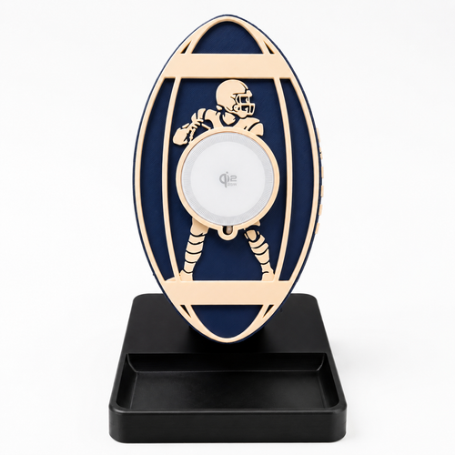Football Wireless Charger Stand in Midnight Navy and Burgundy Red with lace detailing and player silhouette cutout, 25W Qi2 MagSafe charging, made in USA from plant-based PLA