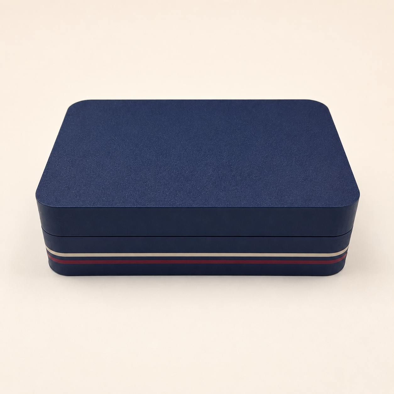 Closed navy clamshell peptide vial storage case with red and white stripe trim